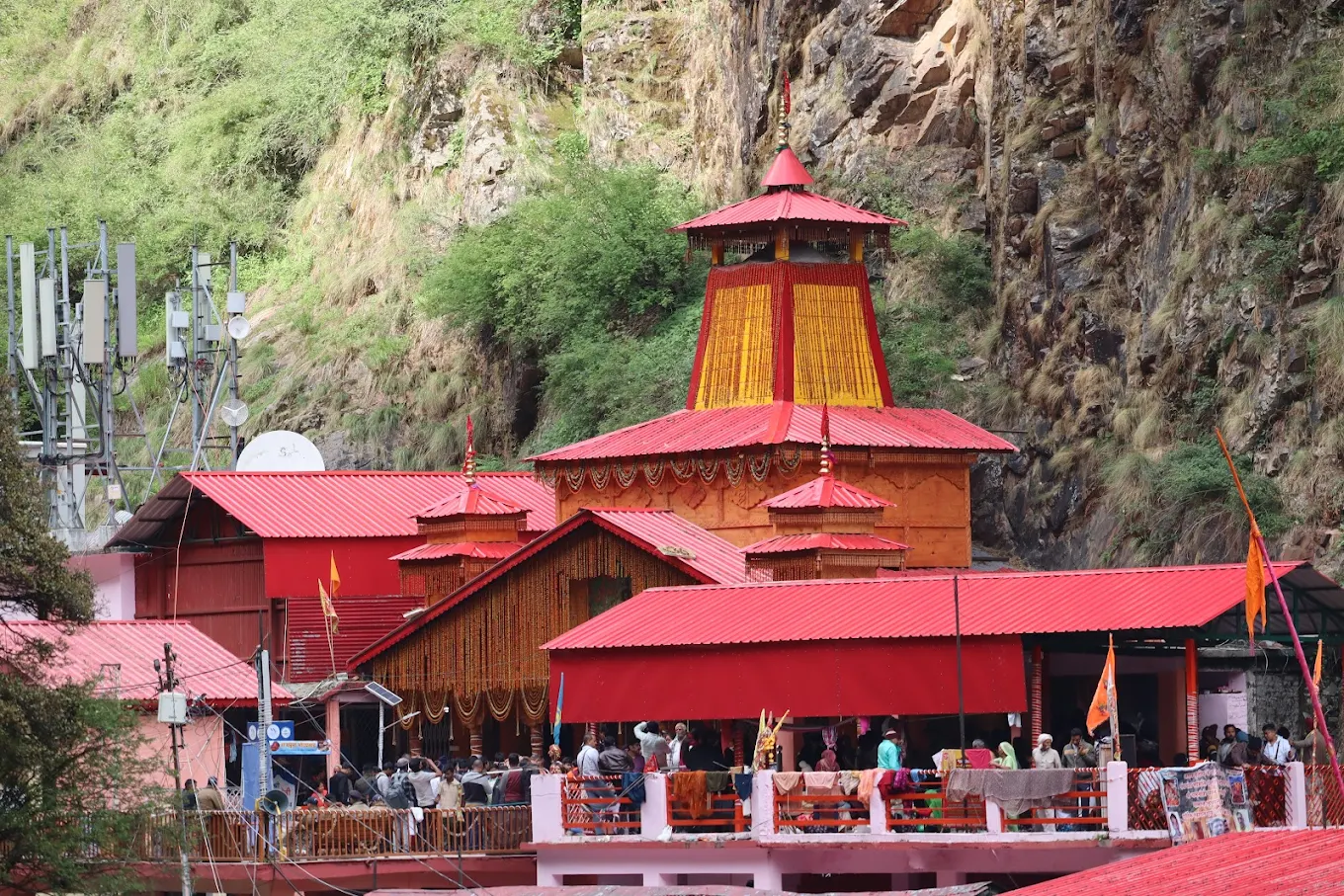 Yamunotri temple dedicated to Goddess Yamuna with hot springs and pilgrims taking sacred bath